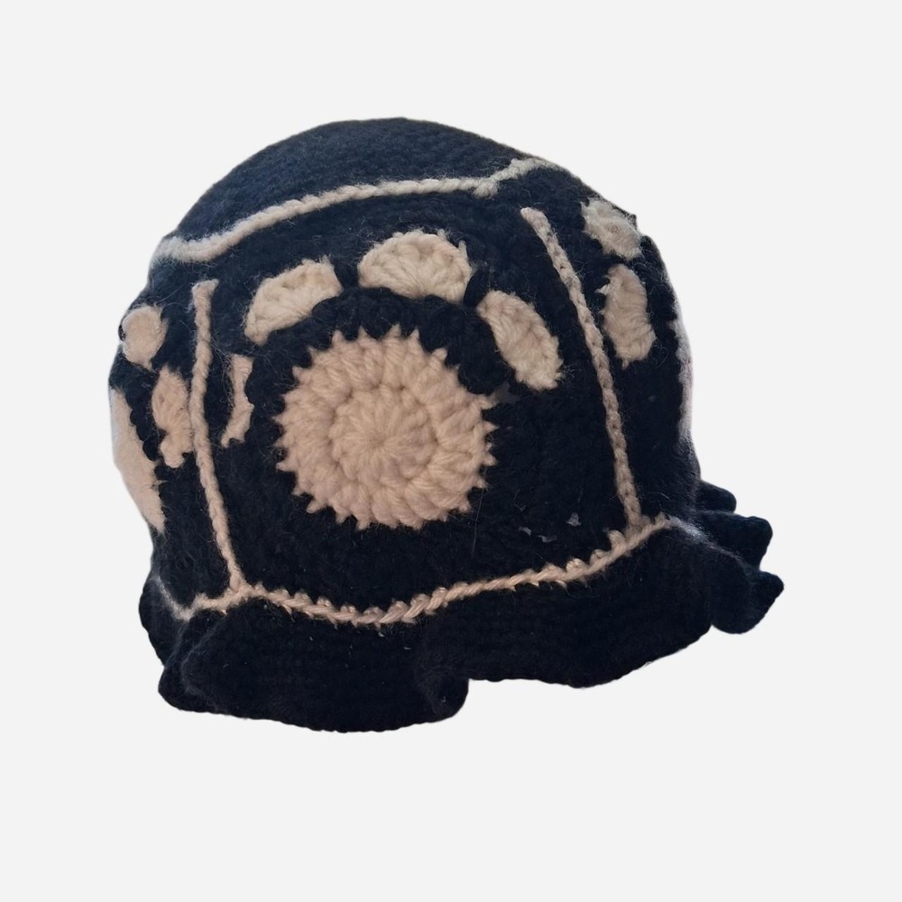 Womens handmade black and white crochet hat with white circular detail